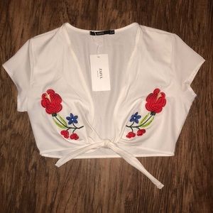 white tie front crop top with embroidered flowers